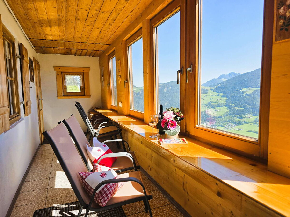 Conservatory with valley view in the Breitbergalm, mountain cabin for groups on the Fügenberg in the Zillertal