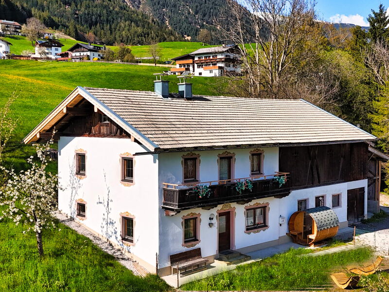 Alpenrehblick by the Karwendel range in spring with blossoming fruit trees, country house for 7 people on the Vomperberg
