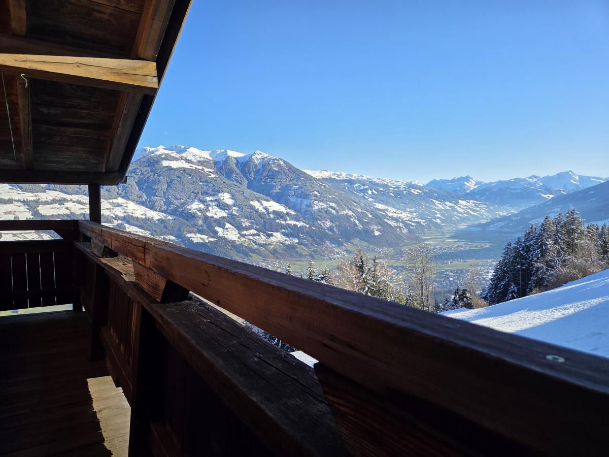 View from the balcony of the Breitbergalm into the Zillertal, panorama on the Fügenberg in Tyrol