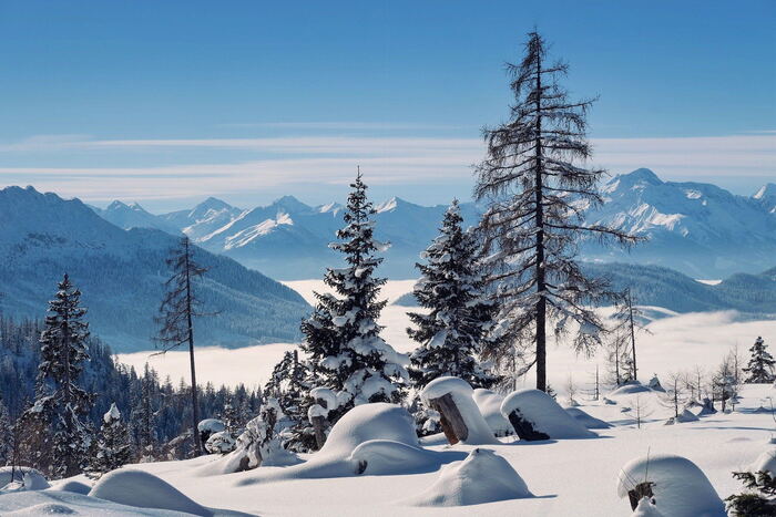 Snow covered mountain landscape in bright light