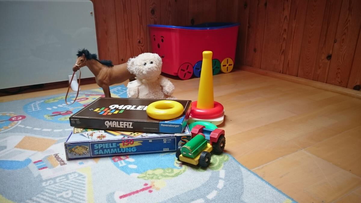 Children's play room in the Grafenhäusl with toys and a play mat, family-friendly holiday house in Tyrol