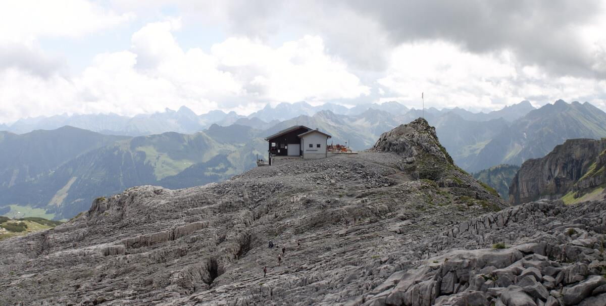 Mountain hut on the rocky Gottesacker karst plateau above the Kleinwalsertal, a stop on a hike from the Sonnenbalkon luxury lodge Bärenkopf