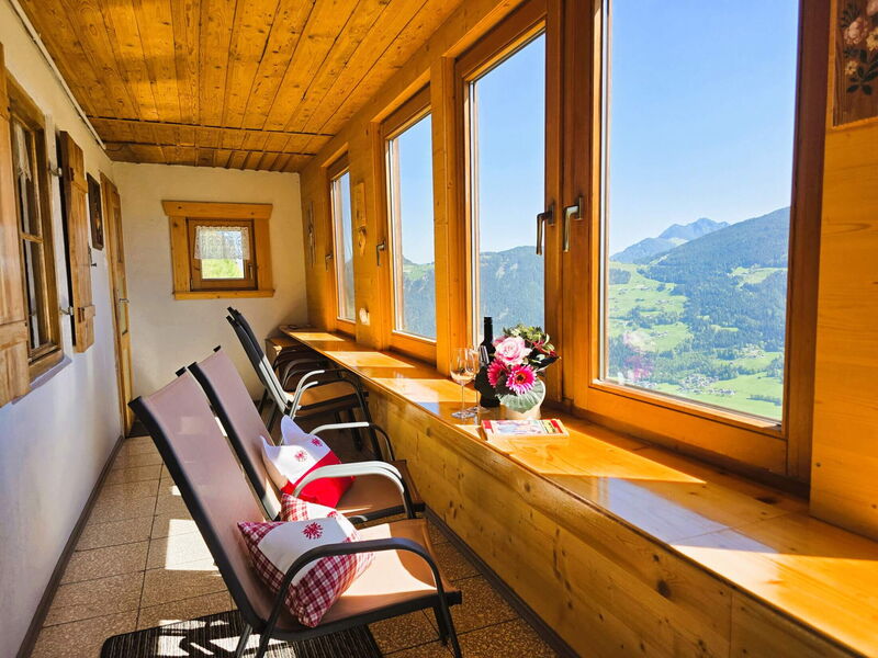 Conservatory with valley view in the Breitbergalm, alpine hut for groups on the Fügenberg in the Zillertal